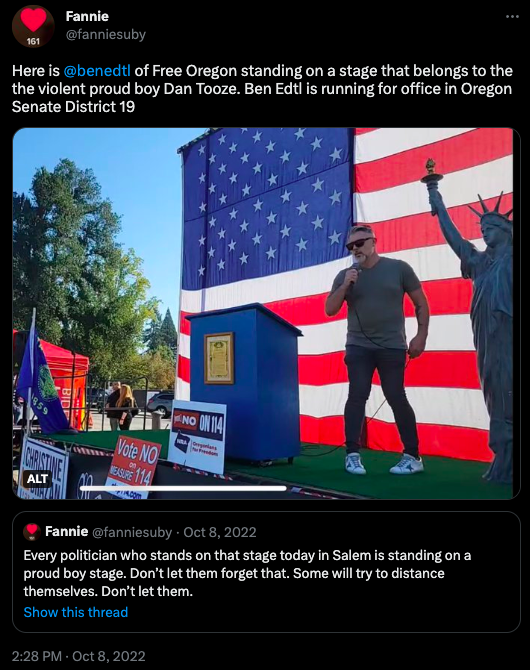 Screenshot of a twitter post from user fanniesuby, reading "Here is 
@benedtl
 of Free Oregon standing on a stage that belongs to the the violent proud boy Dan Tooze. Ben Edtl is running for office in Oregon Senate District 19". Below the text is an image of Ben Edtl standing on Dan Tooze's stage with a microphone in his hand. Below this image is a tweet that was quote-tweeted, which reads "Every politician who stands on that stage today in Salem is standing on a proud boy stage. Don’t let them forget that. Some will try to distance themselves. Don’t let them."