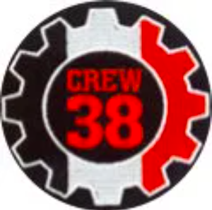 Crew 38 logo, a tricolor gear (black, white, red)