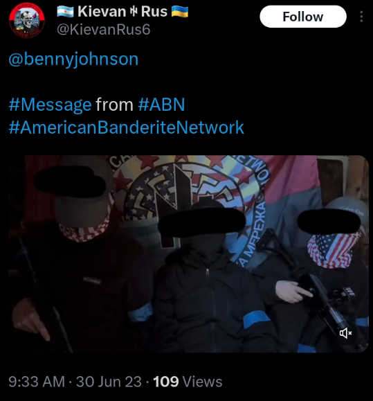 A tweet from @KievanRus6 tags @bennyjohnson and says #Message from #ABN #AmericanBanderiteNetwork and shows a still from a video of 3 young men, all sitting closely to each other, 2 are holding rifles, all 3 have their faces covered with gaiters. There is an American Banderite Flag behind them.