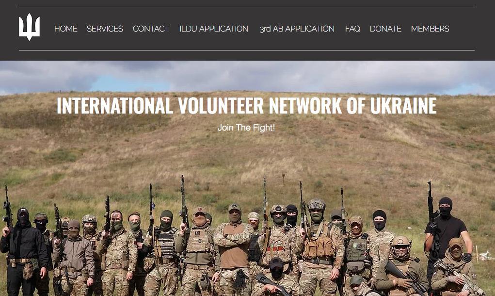 Photo of the Team Ukraine International homepage. The banner text reads "INTERNATIONAL VOLUNTEER NETWORK OF UKRAINE. Join the Fight!" The background image is a bunch of soldiers with rifles.